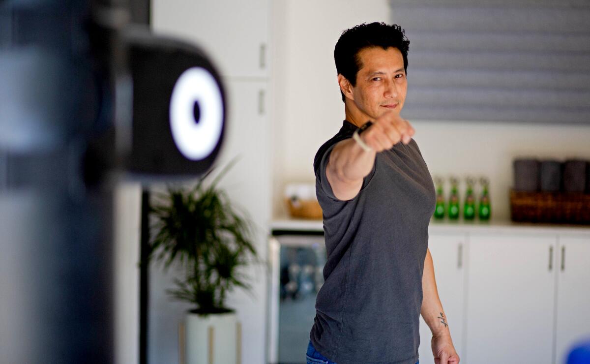 Actor and martial artist Will Yun Lee in the favorite room, the gym, of his Tarzana home.