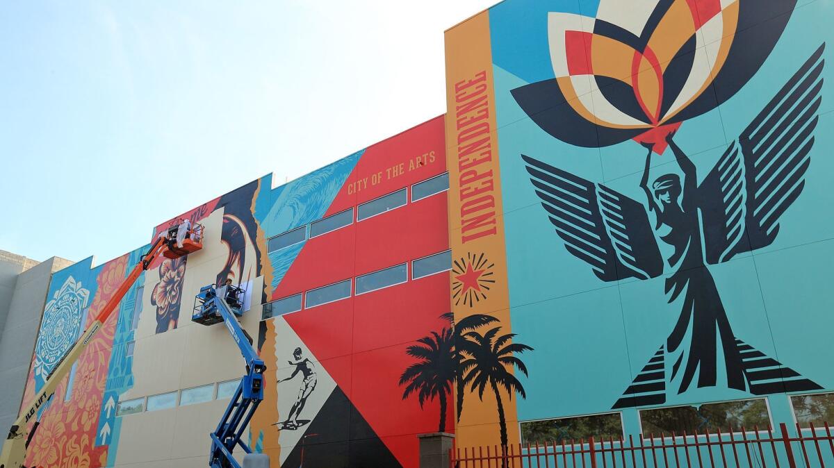 Street artist Shepard Fairey and his team completed a massive mural at the Baker Block apartment complex in Costa Mesa in 2017.