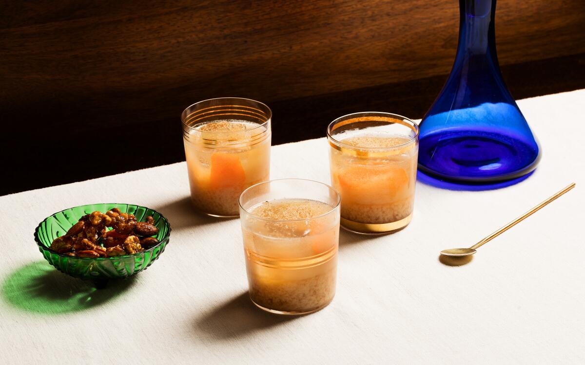 Reminiscent of eggnog and milk punch, this whiskey cocktail is garnished with nutmeg for holiday flair.