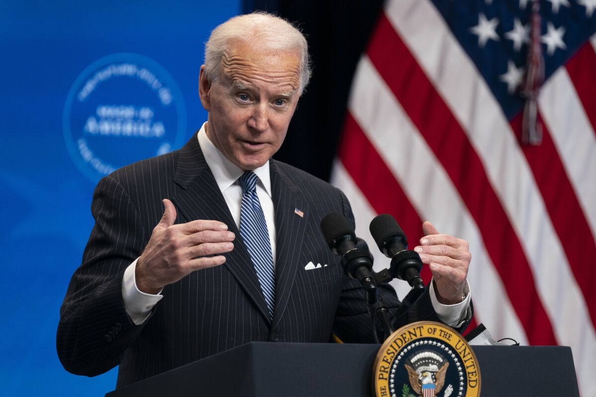 President Biden speaks to reporters at the White House on Monday.