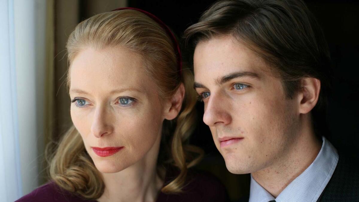 Tilda Swinton, left, and Mattia Zaccaro are shown in a scene from, "I am Love."