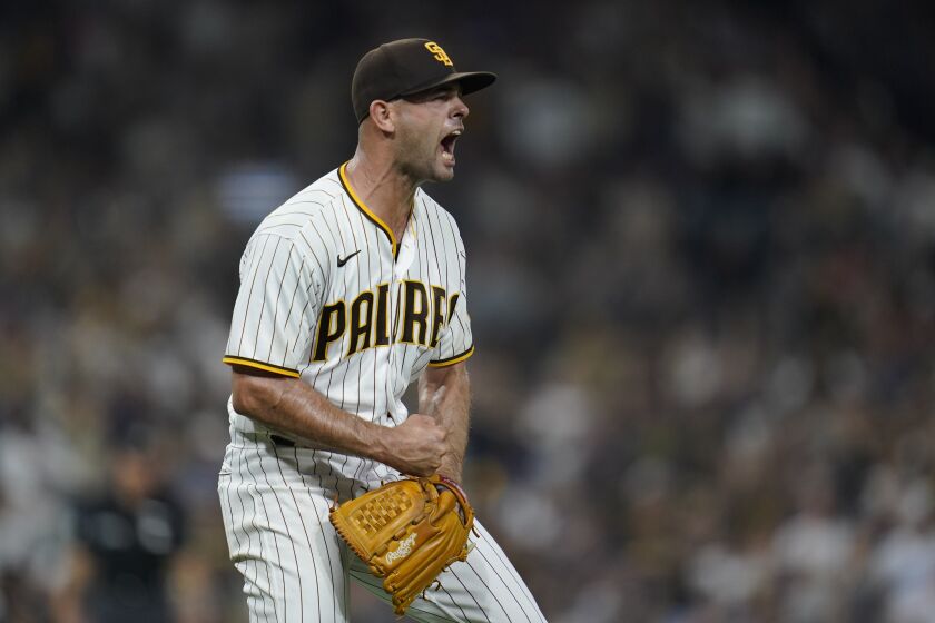 San Diego Padres relief pitcher Nick Martinez reacts during the sixth inning of the tema's baseball game against the Los Angeles Dodgers, Tuesday, Sept. 27, 2022, in San Diego. (AP Photo/Gregory Bull)
