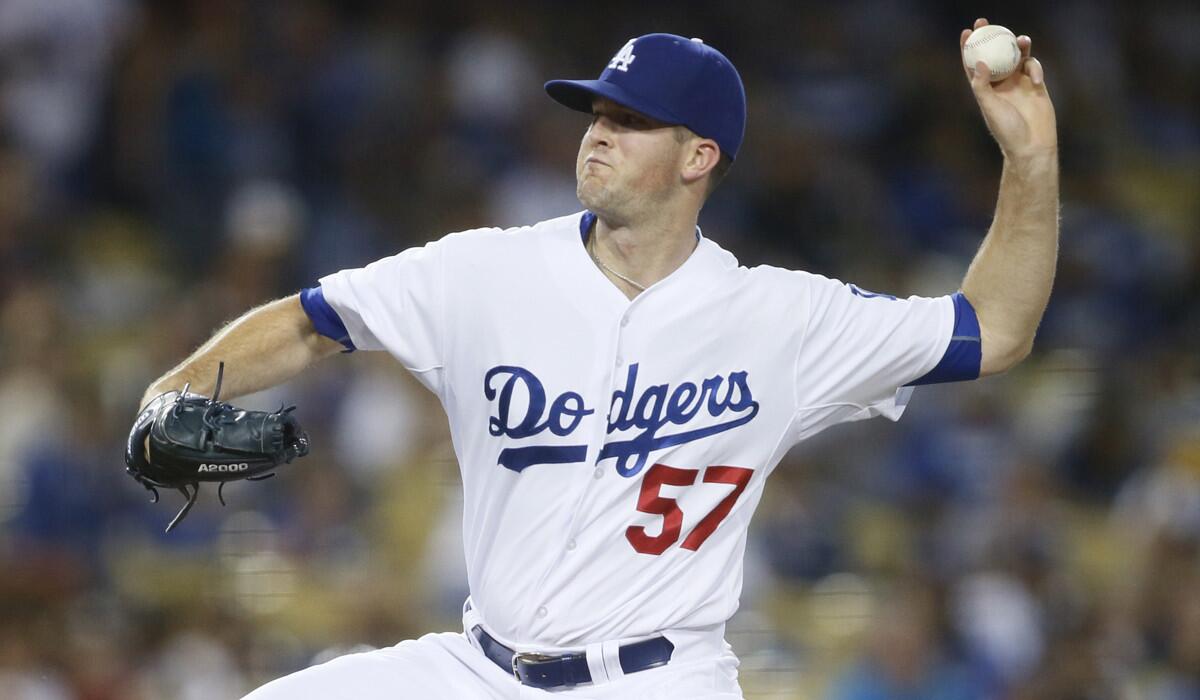 Los Angeles Dodgers starting pitcher Alex Wood pitches against the Colorado Rockies on Wednesday.