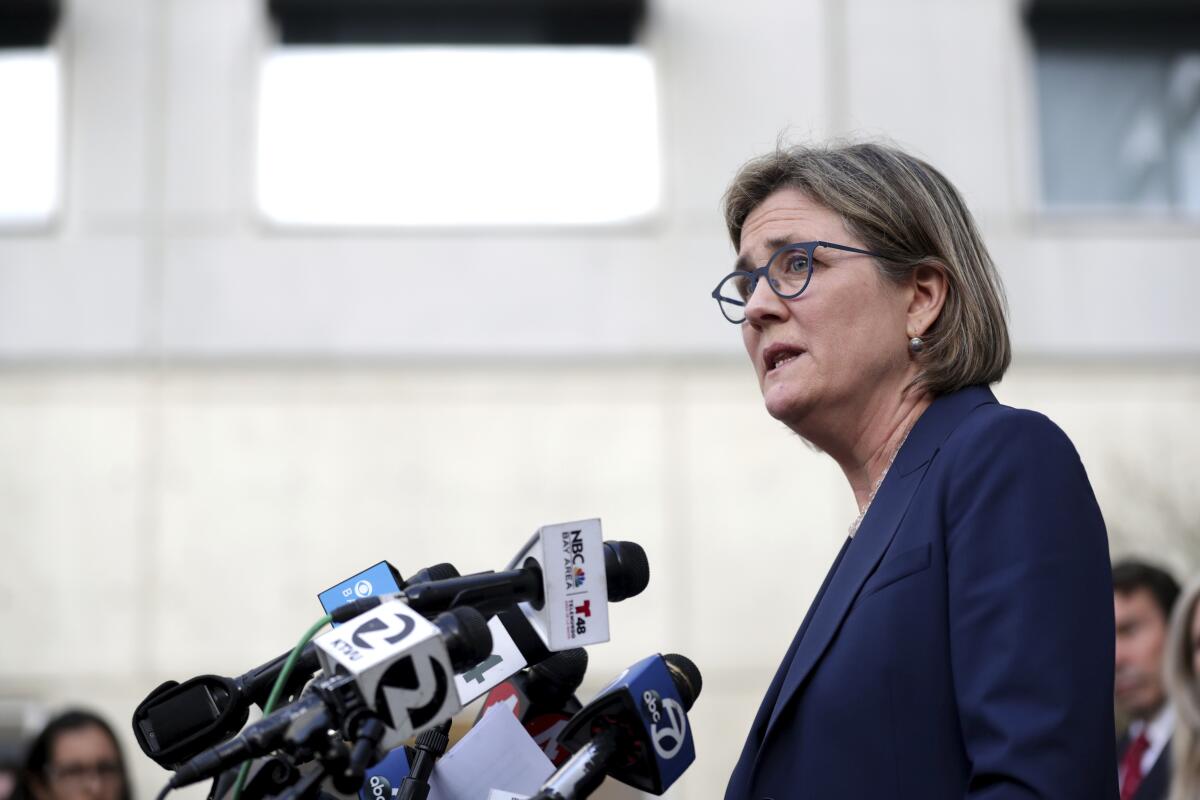 Dr. Sara Cody, Santa Clara County public health director, speaks at a news conference.