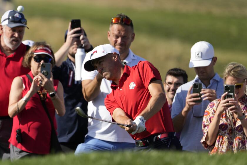 United States' Justin Thomas chips onto the 10th green during a practice round ahead of the Ryder Cup at the Marco Simone Golf Club in Guidonia Montecelio, Italy, Tuesday, Sept. 26, 2023. The Ryder Cup starts Sept. 29, at the Marco Simone Golf Club. (AP Photo/Alessandra Tarantino)