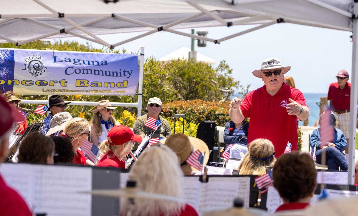 The Laguna Community Concert Band, seen playing on Memorial Day, above, will perform this Sunday at Festival of the Arts.