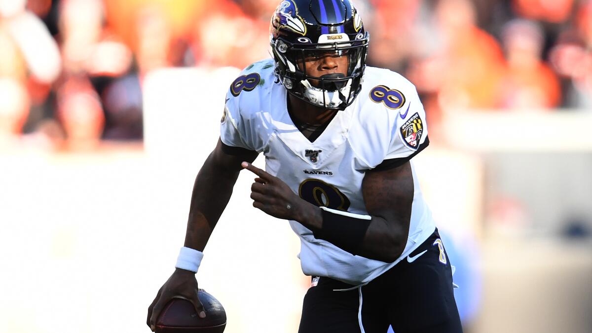 Lamar Jackson fever hits NFL, but Ravens' QB won't change game - Los  Angeles Times