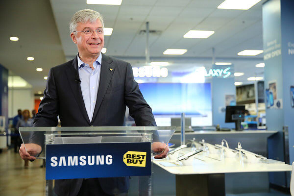 Best Buy CEO Hubert Joly celebrates the opening of the Samsung Experience Shop at a Best Buy in New York on April 24. The electronics retailer reported slumping first-quarter profit and sales on Tuesday.