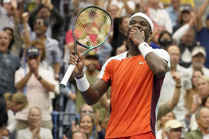 Frances Tiafoe, of the United States, reacts after winning a tie breaker against Andrey Rublev, of Russia, 
