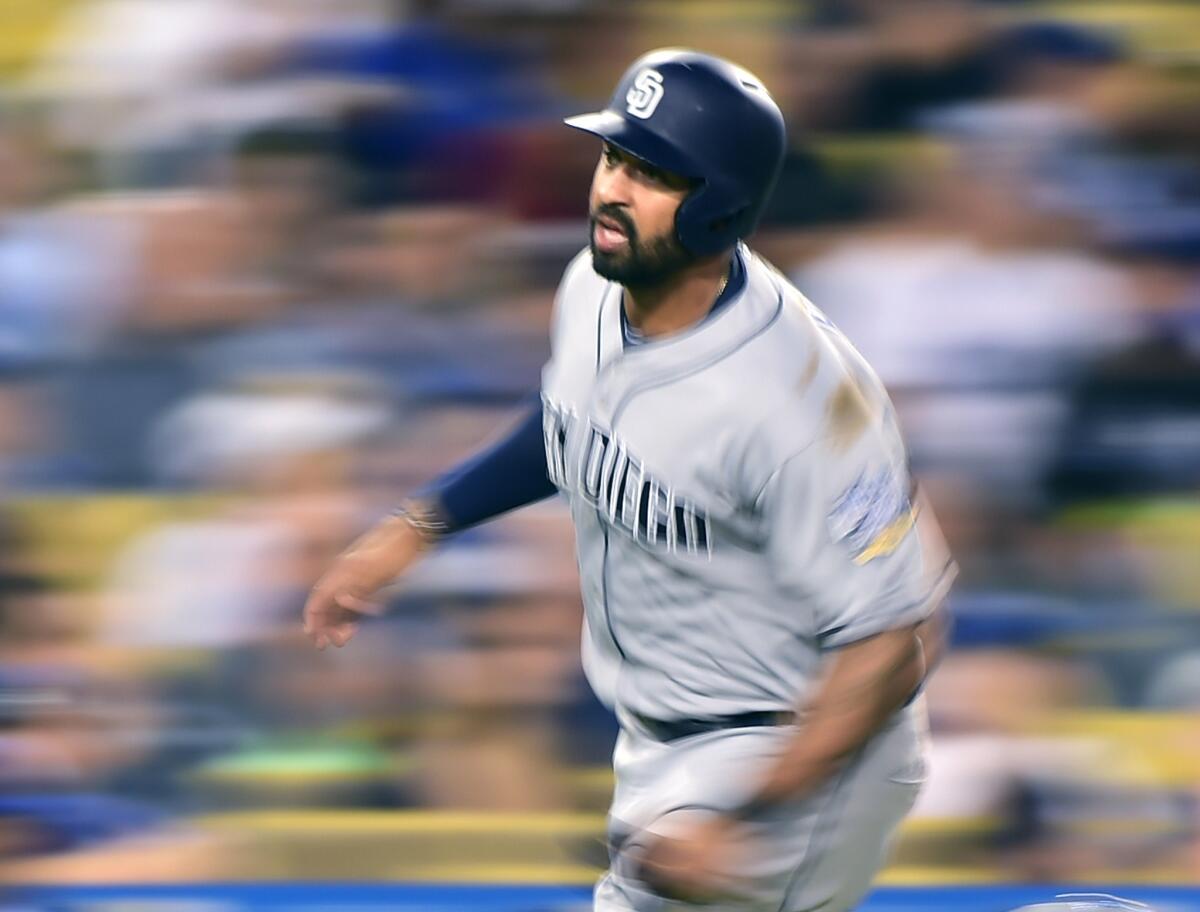 Padres outfielder Matt Kemp (27) runs home to score a run in the fifth inning against the Dodgers on July 7.