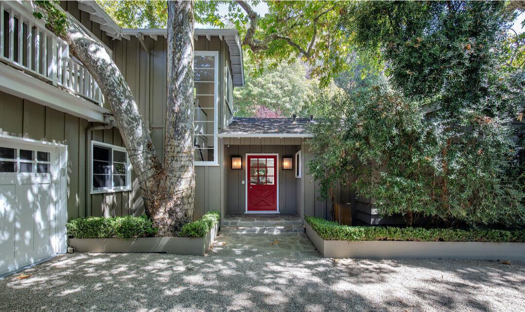 Surrounded by sycamore trees, the leafy residence centers on a five-bedroom traditional built in the 1950s.