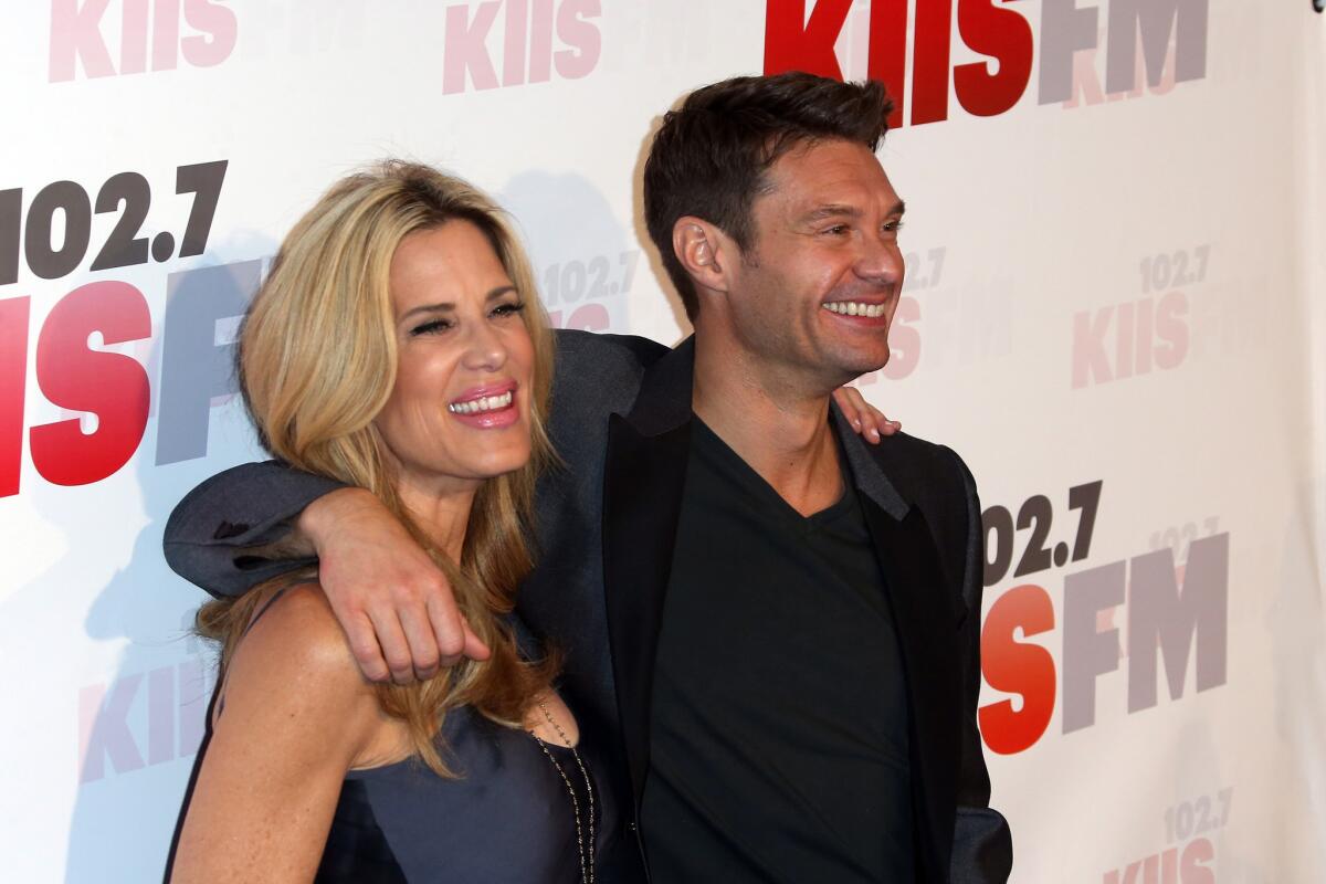 The probe into possible ratings manipulation was launched after KSCA morning show "El Bueno, La Mala y El Feo" leapfrogged to the No. 1 slot over big names such as KIIS-FM (102.7) morning host Ryan Seacrest, left, with fellow radio personality Ellen K.
