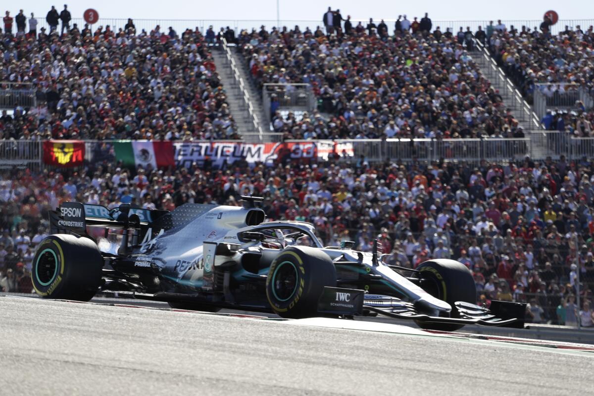 Mercedes driver Lewis Hamilton races during the Formula One U.S. Grand Prix at the Circuit of the Americas.