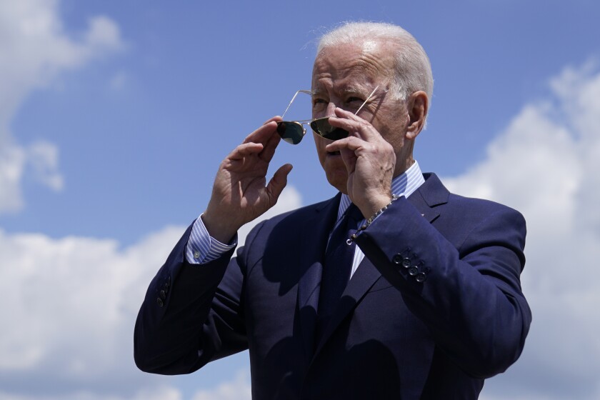 President Biden puts on his sunglasses after speaking at Andrews Air Force Base, Md., on Thursday.