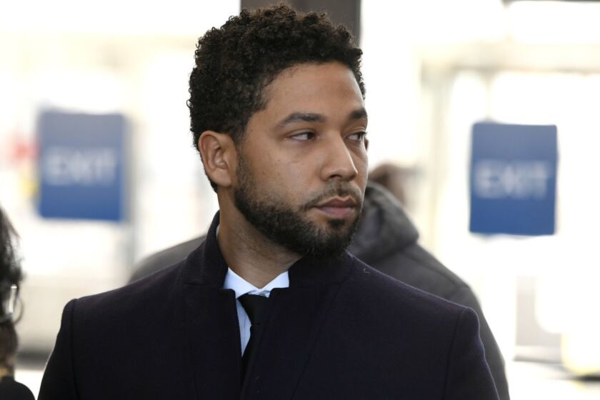 Actor Jussie Smollett looks on during a press conference before leaving Cook County Court after his charges were dropped Tuesday, March 26, 2019, in Chicago. (AP Photo/Paul Beaty)