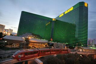 FILE - The Las Vegas Monorail passes by MGM Grand, April, 27, 2006, in Las Vegas. A “cybersecurity issue” led to the shutdown of some casino and hotel computer systems at MGM Resorts International properties across the U.S., a company official reported Monday, Sept. 11, 2023. (AP Photo/Jae C. Hong, File)