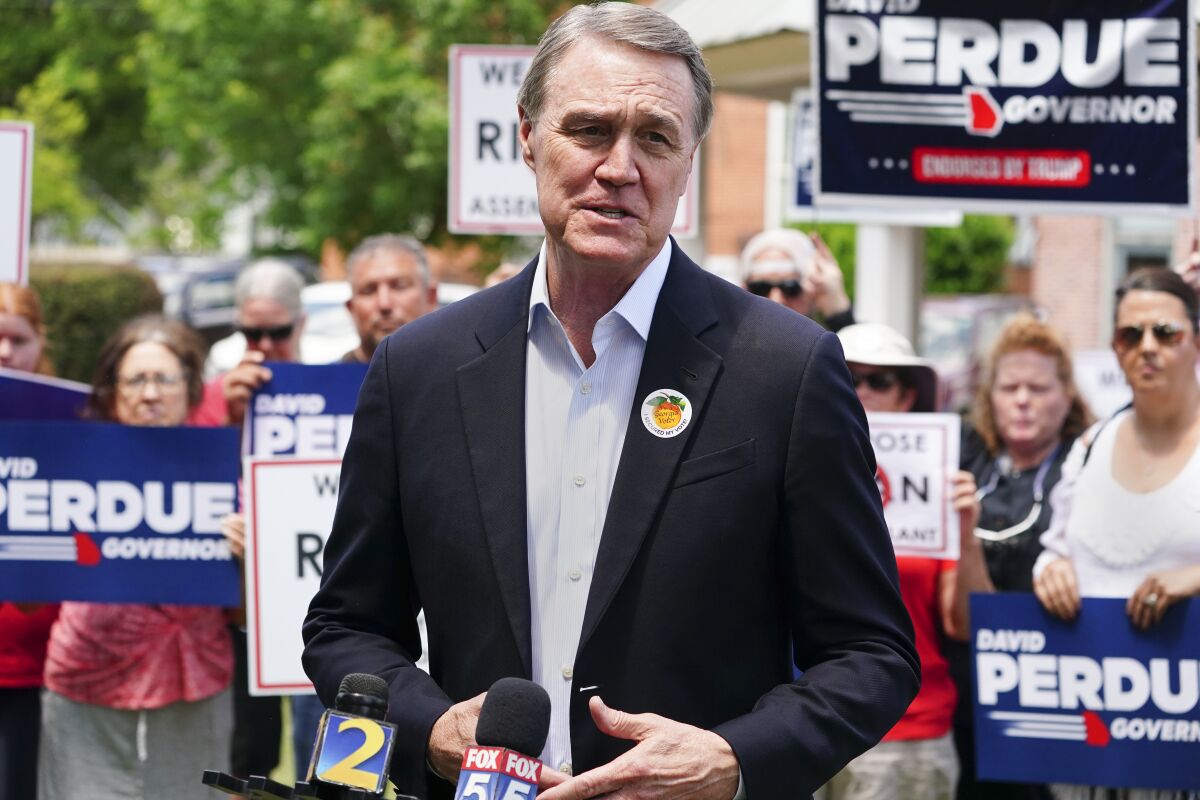 FILE - Republican candidate for Georgia Governor former U.S. Senator David Perdue speaks Tuesday, May 3, 2022, in Rutledge, Ga. A Georgia judge has dismissed a lawsuit on Wednesday, May 11, filed by former U.S. Sen. Perdue that alleged fraudulent or counterfeit ballots were counted in the state’s most populous county during the 2020 general election. Perdue filed the lawsuit in December a few days after he announced that he would be challenging Gov. Brian Kemp in the Republican primary. (AP Photo/John Bazemore, File)