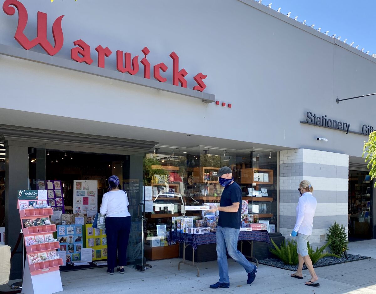 Warwick's on Girard Avenue, along with many other La Jolla businesses, is open for curbside shopping with mask and social distancing requirements.