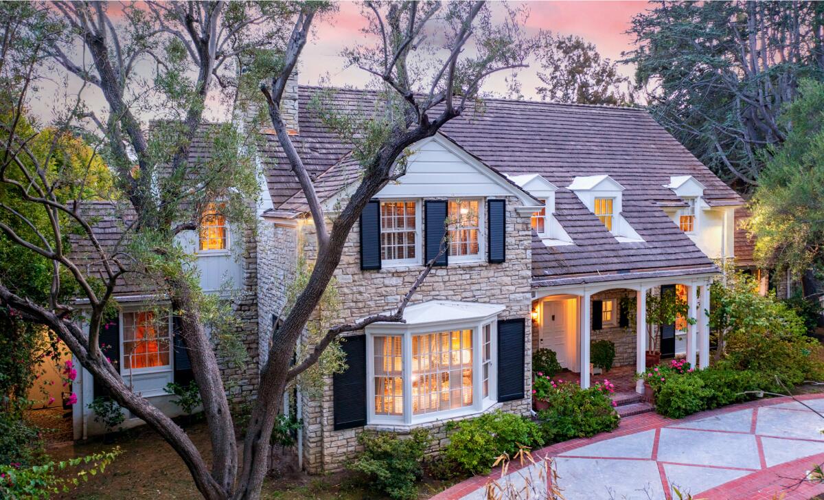 Built in 1937 for $19,800, the Colonial Revival-style home showcases bright colors and a classic Williams-style staircase.