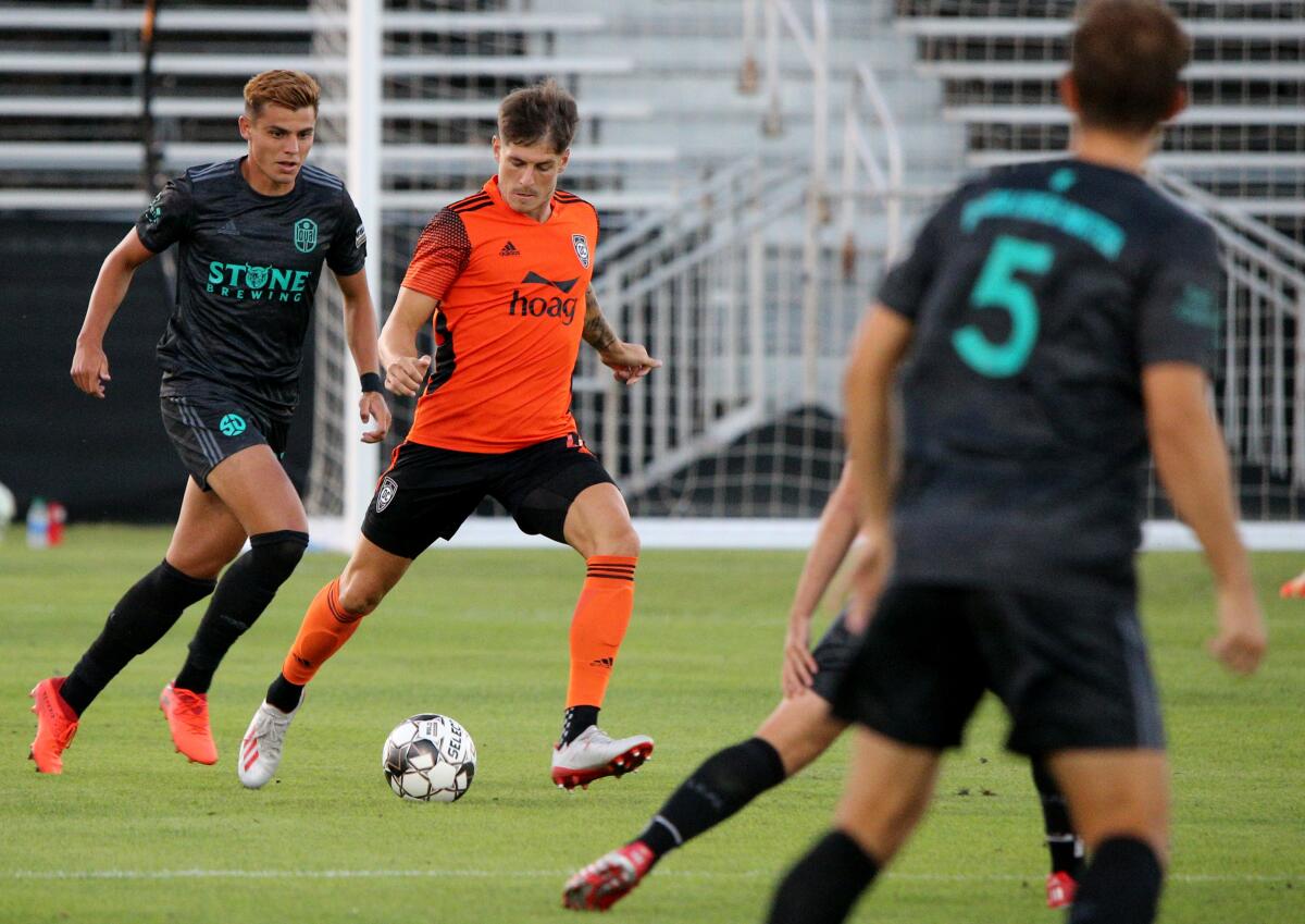 Orange County Soccer Club defender Rob Kiernan clears the ball in a home game versus the San Diego Loyal on Saturday.