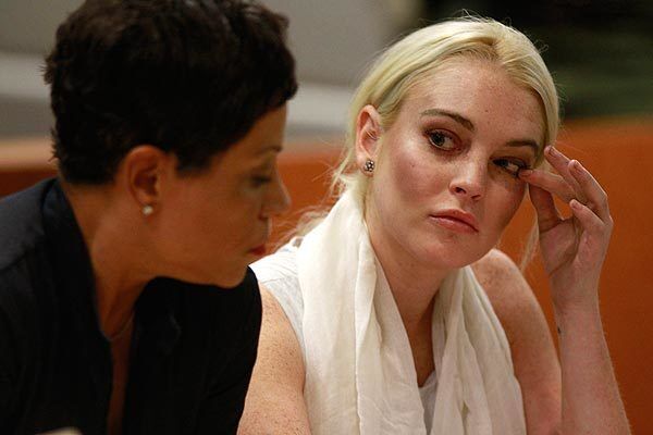 Lindsay Lohan and her lawyer, Shawn Chapman Holley, in court.