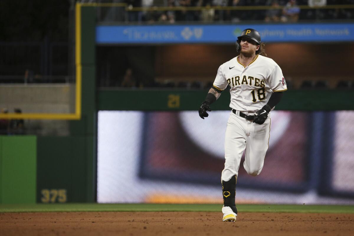 Pittsburgh Pirates' Ben Gamel (18) runs the bases after hitting a home run in the sixth inning of a baseball game against the Washington Nationals, Saturday, Sept. 11, 2021, in Pittsburgh. (AP Photo/Rebecca Droke)