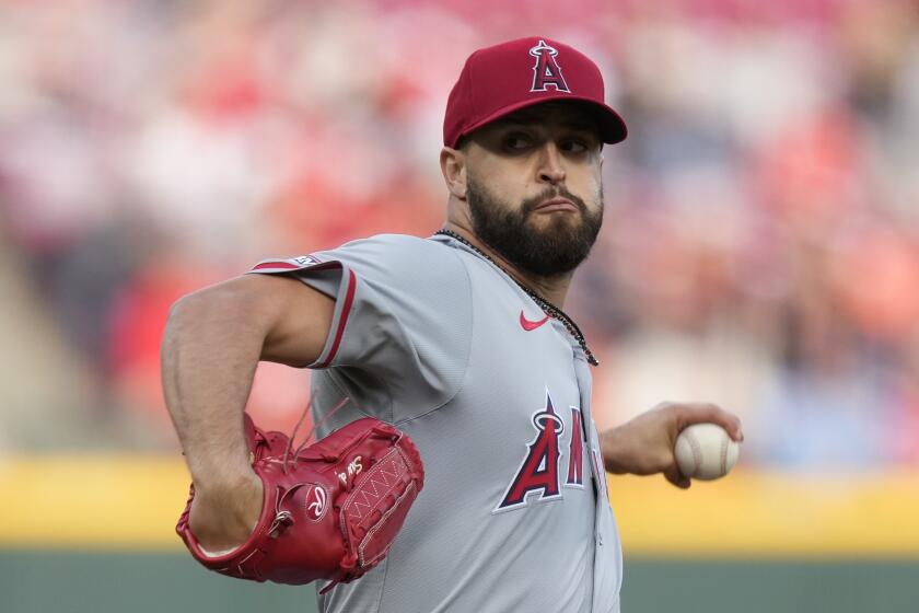 Los Angeles Angels starting pitcher Patrick Sandoval throws in the first inning of a baseball game.