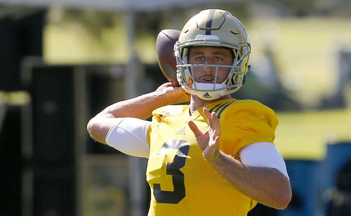 UCLA quarterback Josh Rosen looks for a receiver during a recent practice at Cal State San Bernardino.