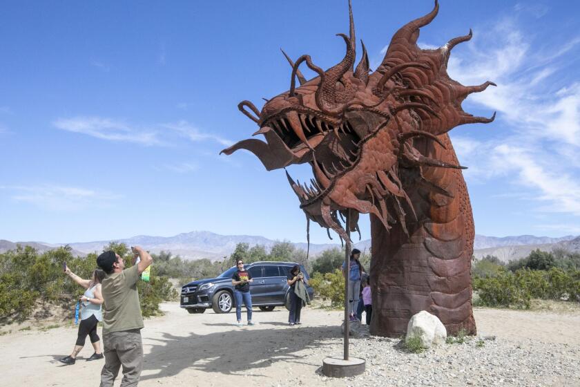 Although the Anza Borrego State Park is closed, the works of artist Carlos Breceda are on private property and not closed. The Sanchez family escaped their home to get some fresh air in Borrego Springs, CA, on Wednesday, April 1, 2020 during the Coronavirus pandemic.
