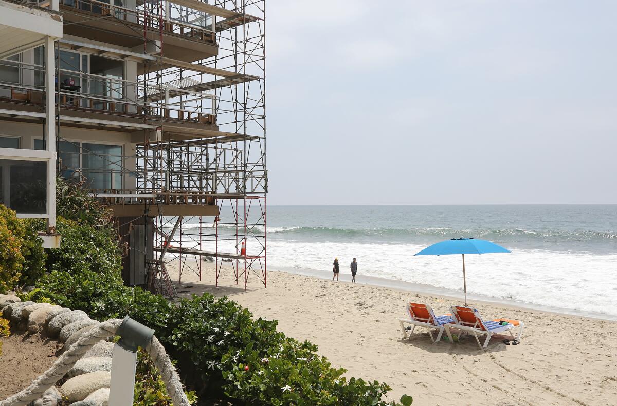 A view of the Pacific Edge Hotel with work scaffolds in place in Laguna Beach.