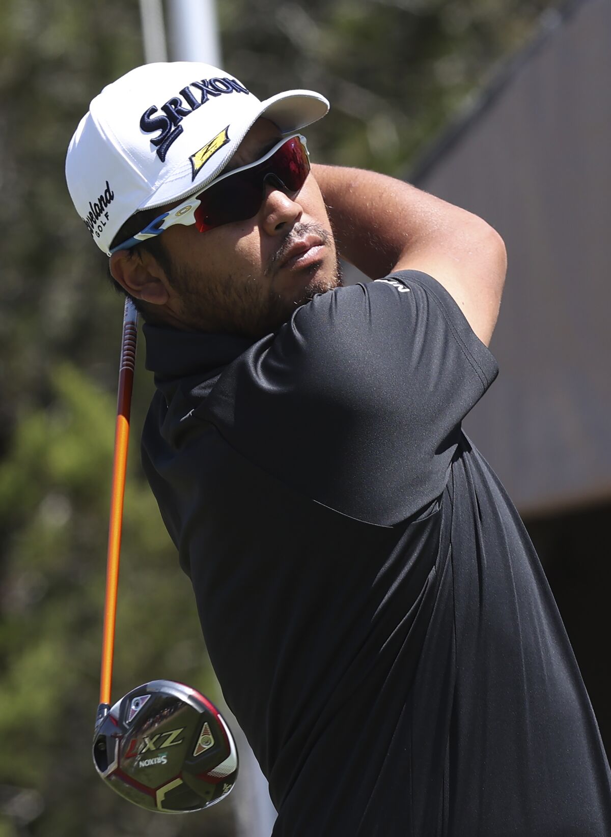 Hideki Matsuyama hits off the first tee on the first day of play at the Valero Texas Open golf tournament in San Antonio, Thursday, March 31, 2022. (Jerry Lara/The San Antonio Express-News via AP)