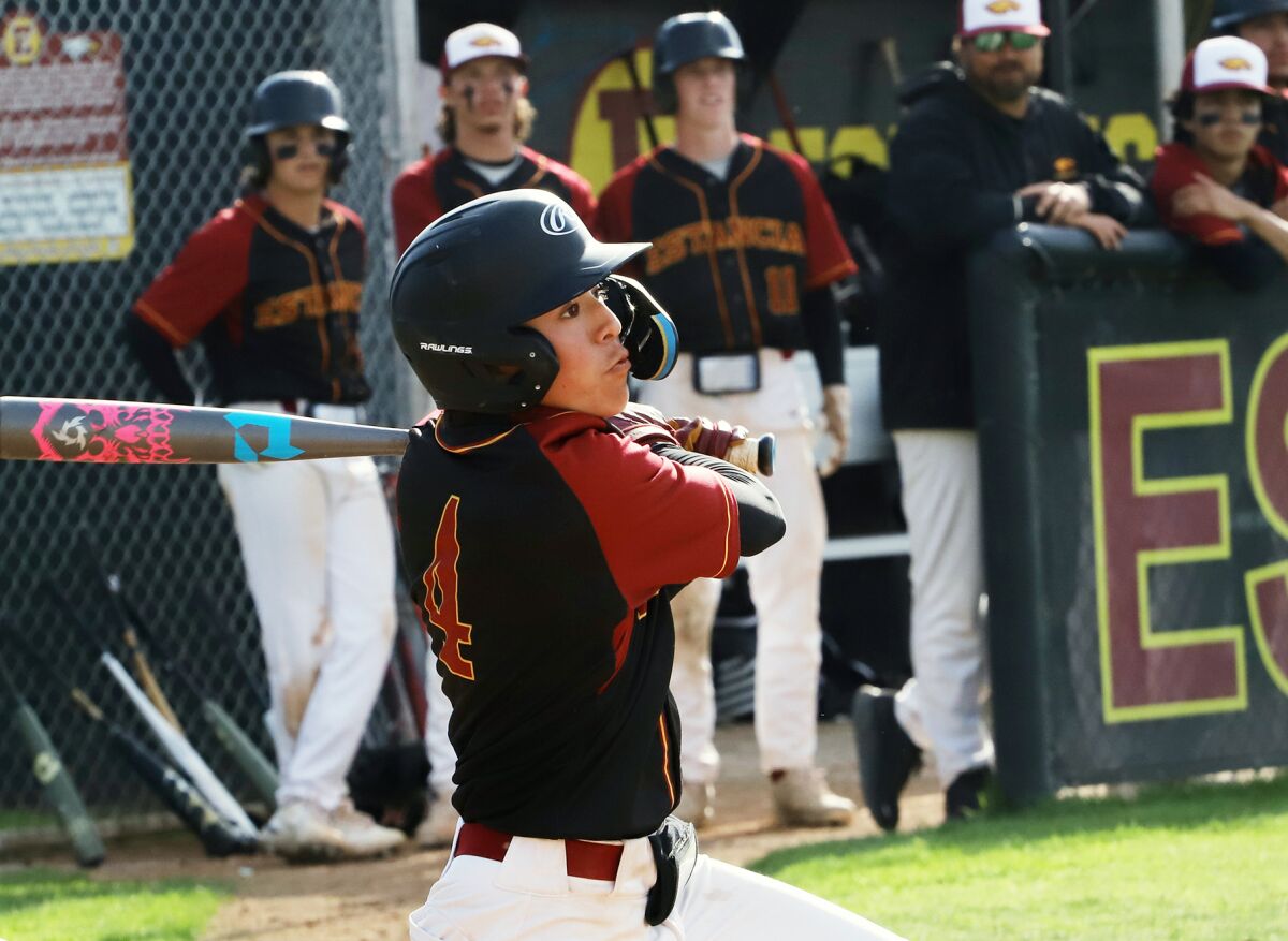 Estancia's Jake Humphries (4) hits a double in the top of the seventh inning against Calvary Chapel on Friday.