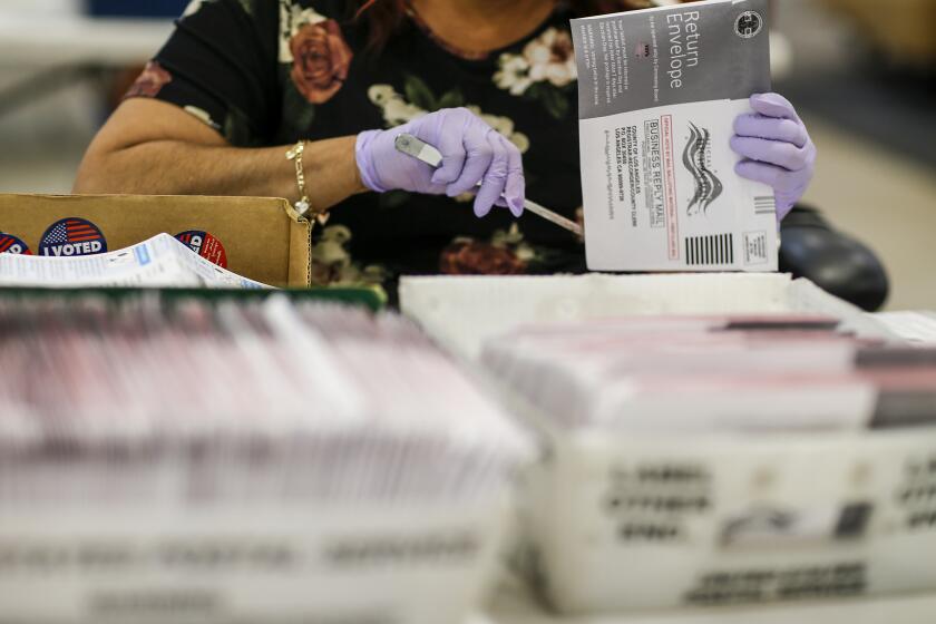 Industry, CA, Thursday, June 16, 2022 - Mail in ballots are processed at a County facility where they are received from the post office, opened, sorted and verified then sent to be counted in Downey. (Robert Gauthier/Los Angeles Times)