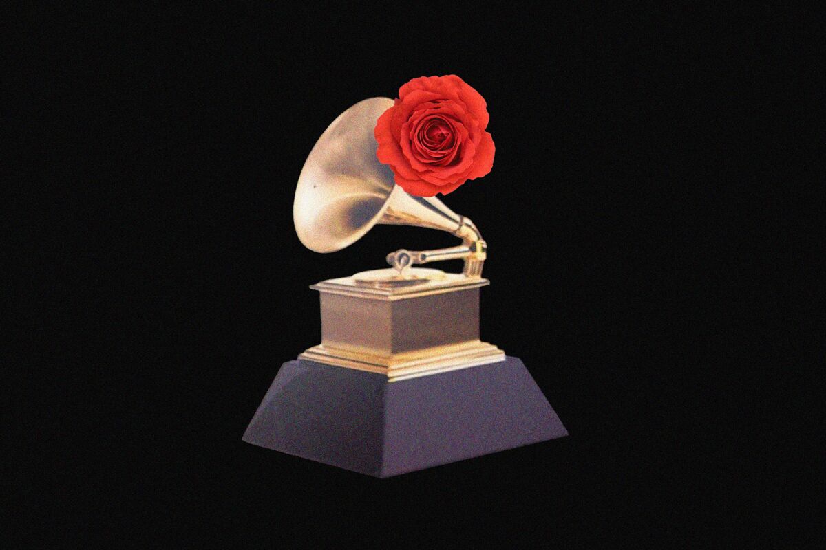 A Grammy Award with a red flower on it.