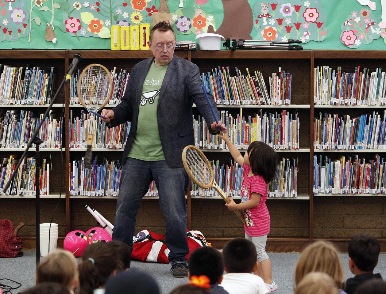 Photo Gallery: Comic juggler Michael Rayner performs for children at La Canada Library