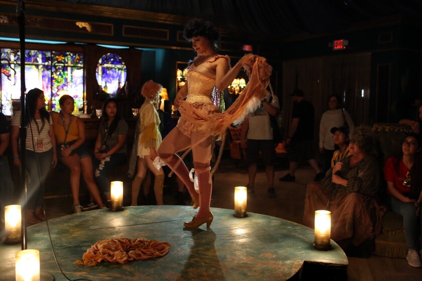 A dancer performs in the speakeasy burlesque show in the "Carnival Row" experience during San Diego Comic-Con.