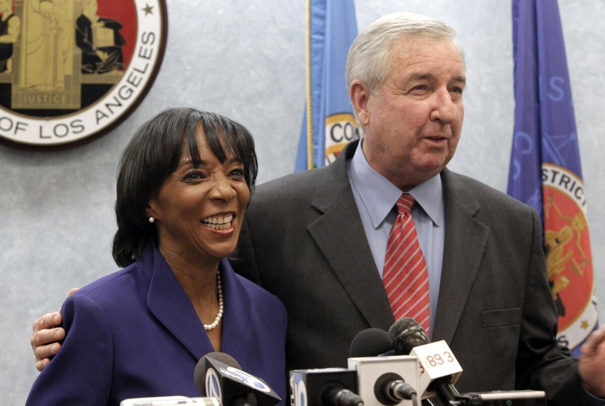 Los Angeles Dist. Atty. Jackie Lacey is getting credit for revising the Brady Alert System guidelines, however, some feel that her appeal in an Irwindale corruption case is misguided. Above: Shortly after she was elected, Lacey joined her predecessor Steve Cooley for a news conference.