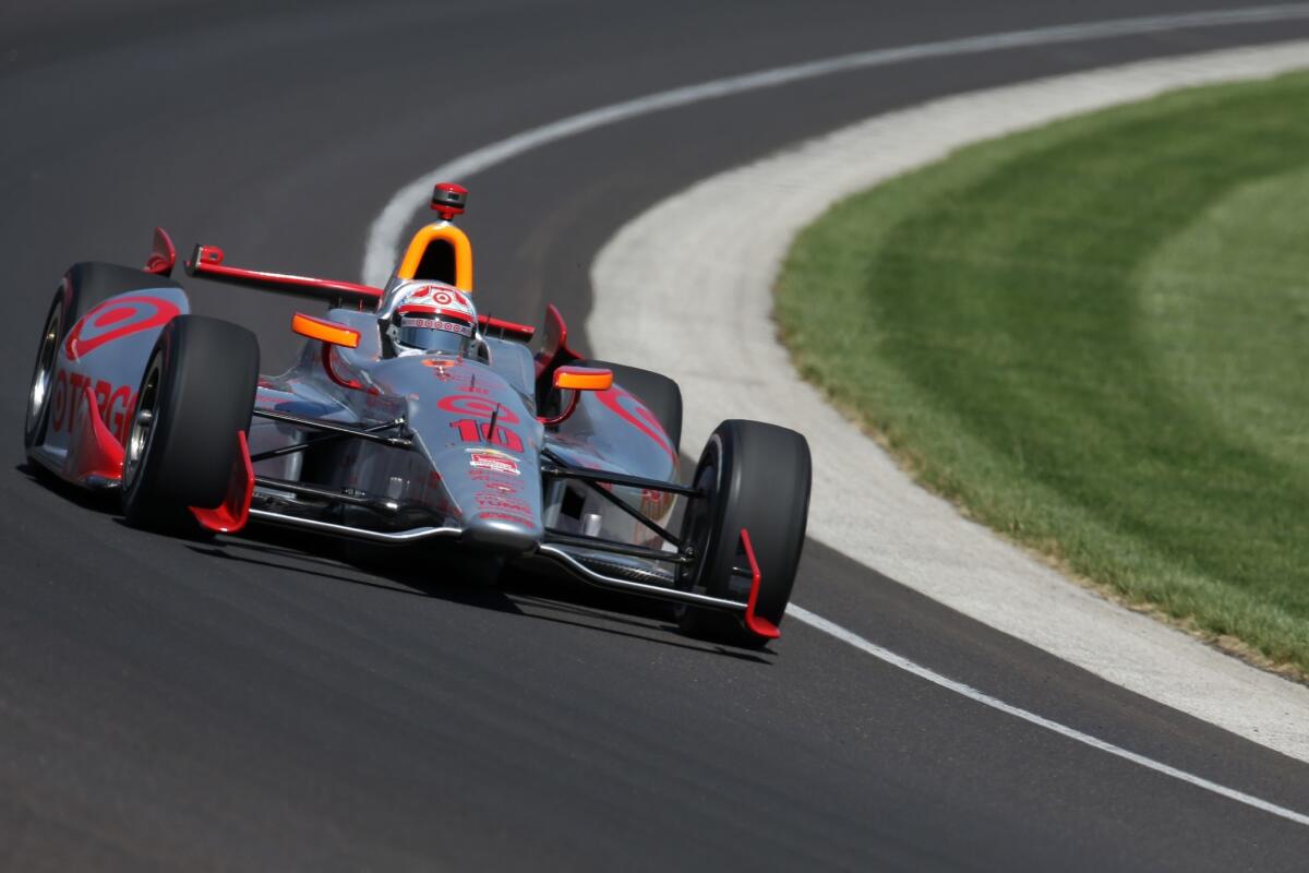 Tony Kanaan of Brazil drives Friday during the final practice before the Indianapolis 500 Mile Race.