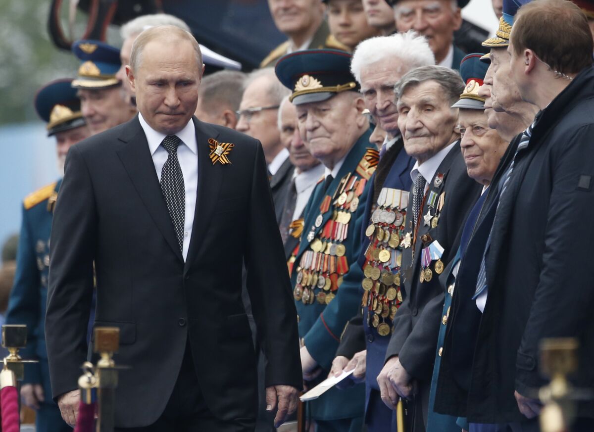 Spring is not turning out the way Russian President Vladimir Putin (seen here in May 2019) might have planned it, with a nationwide vote allowing him to stay in power until 2036 postponed.