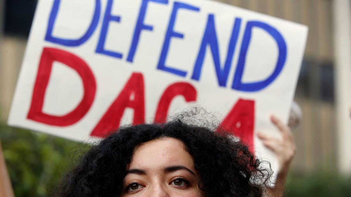 Loyola Marymount student Maria Carolina Gomez joins a rally in Los Angeles in September to support the Deferred Action for Childhood Arrivals program.