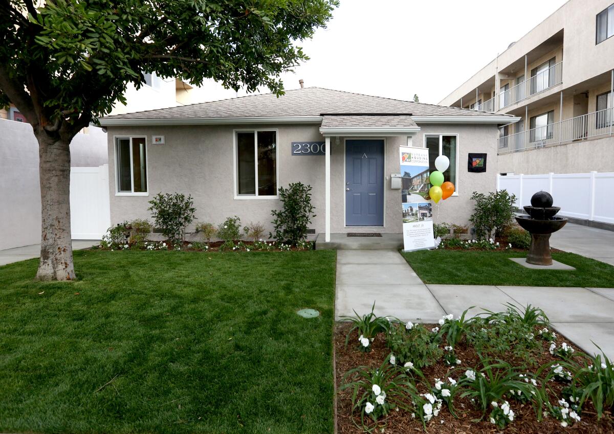 The Burbank Housing Corp. held an open house to show its newest affordable-housing project called the Fairview Cottages, located in he 2300 block of North Fairview St., in Burbank on Thursday. There are three single-family homes on the property. The two front ones have one bedroom and the one at the rear has two bedrooms. Amenities include stoves, hook-ups for washers and dryers, a heating-and-air conditioning system, tankless water heaters and new cabinetry.