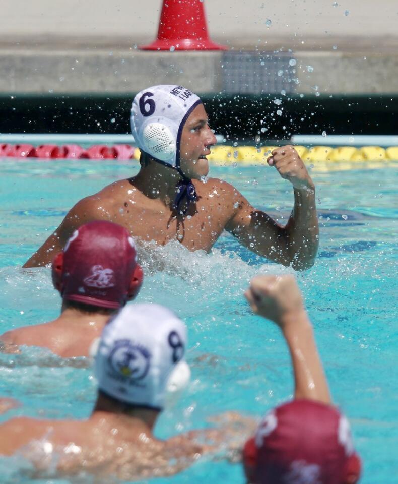 Tommaso Baldineti (6) of Newport Beach Water Polo reacts after evening the score, 6-6, during the fourth period against the Trojan Water Polo Cardinal team in the USA Junior Olympics 14U boys' bronze match at the William Woollett Aquatic Center in Irvine on Tuesday.