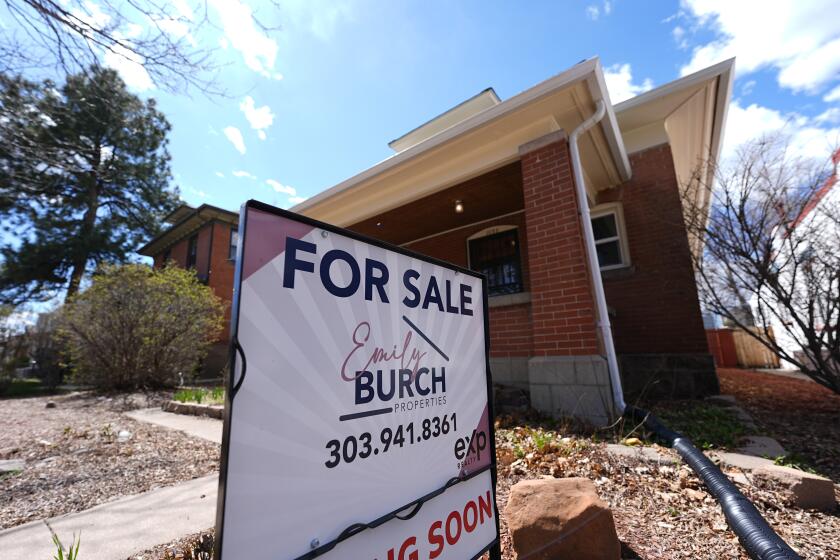 A for sale sign stands outside a home on the market Wednesday, April 3, 2024, in Denver. On Thursday, May 8, 2024, Freddie Mac reports on this week's average U.S. mortgage rates. (AP Photo/David Zalubowski)