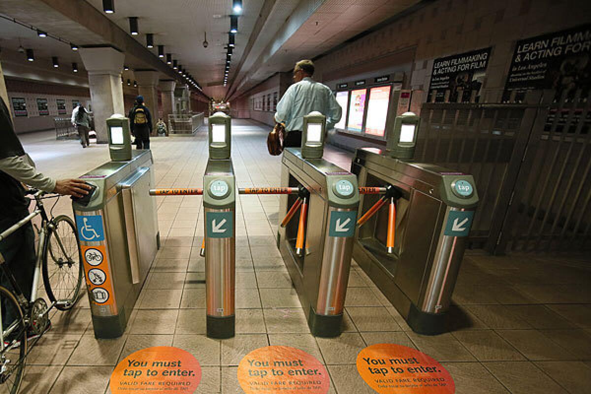 Metro subway turnstiles at Union Station are shown. A former lawyer for the MTA who defended the agency in multimillion-dollar lawsuits was convicted Tuesday of grand theft.