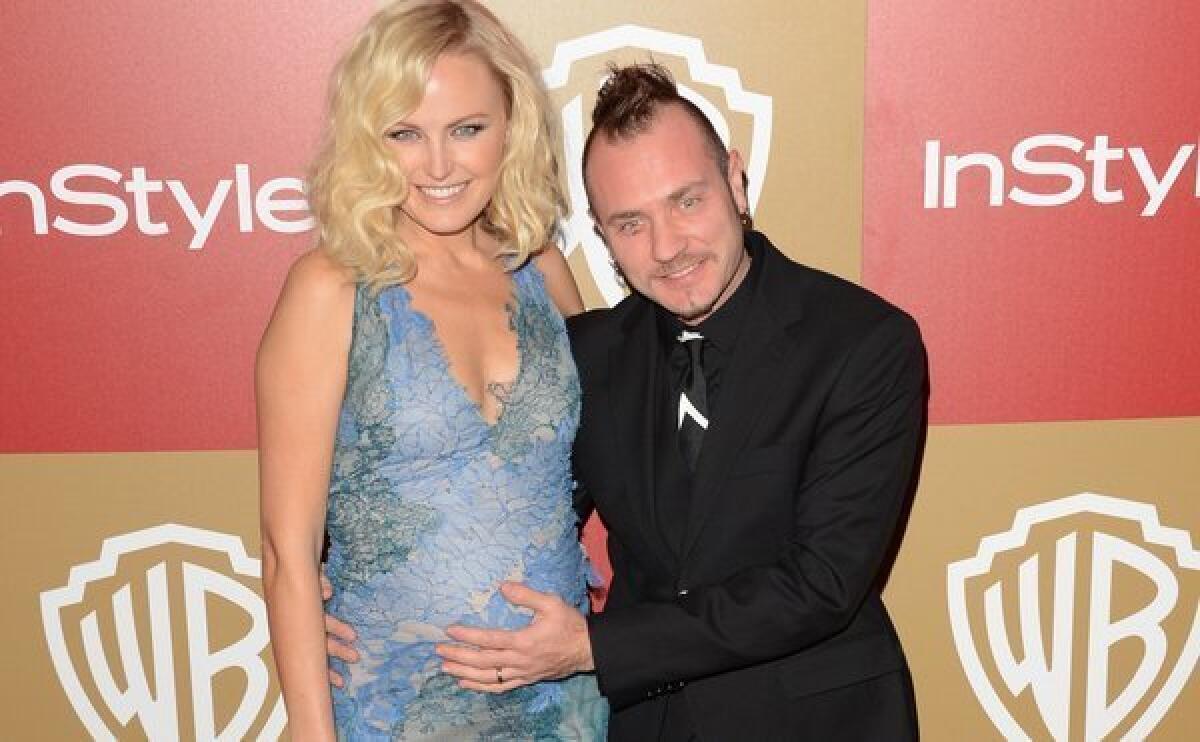 Malin Akerman and her husband, Roberto Zincone, who have welcomed a baby boy.