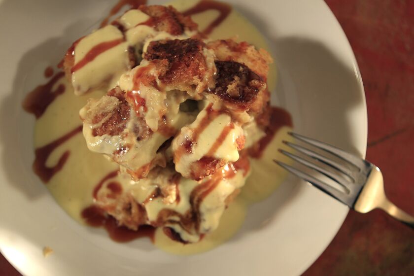 Pete's Cafe's bread pudding comes drizzled with caramel sauce and a creme anglaise. Recipe