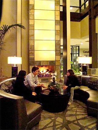 A cozy fire is a favorite gathering spot in the lobby of the Newpark Resort in Park City. The upscale hotel is among the local spots offering deals in hopes of improving post-holiday business.