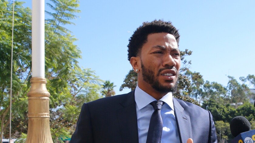 New York Knicks basketball player Derrick Rose arrives at the federal courthouse in downtown Los Angeles during his rape trial in federal civil court.