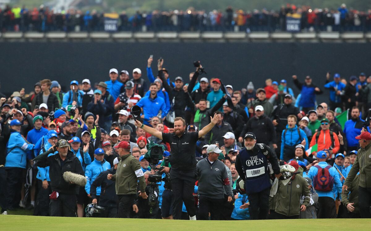 Shane Lowry of Ireland celebrates on the 18th hole during the final round of the 148th Open Championship on July 21, 2019.