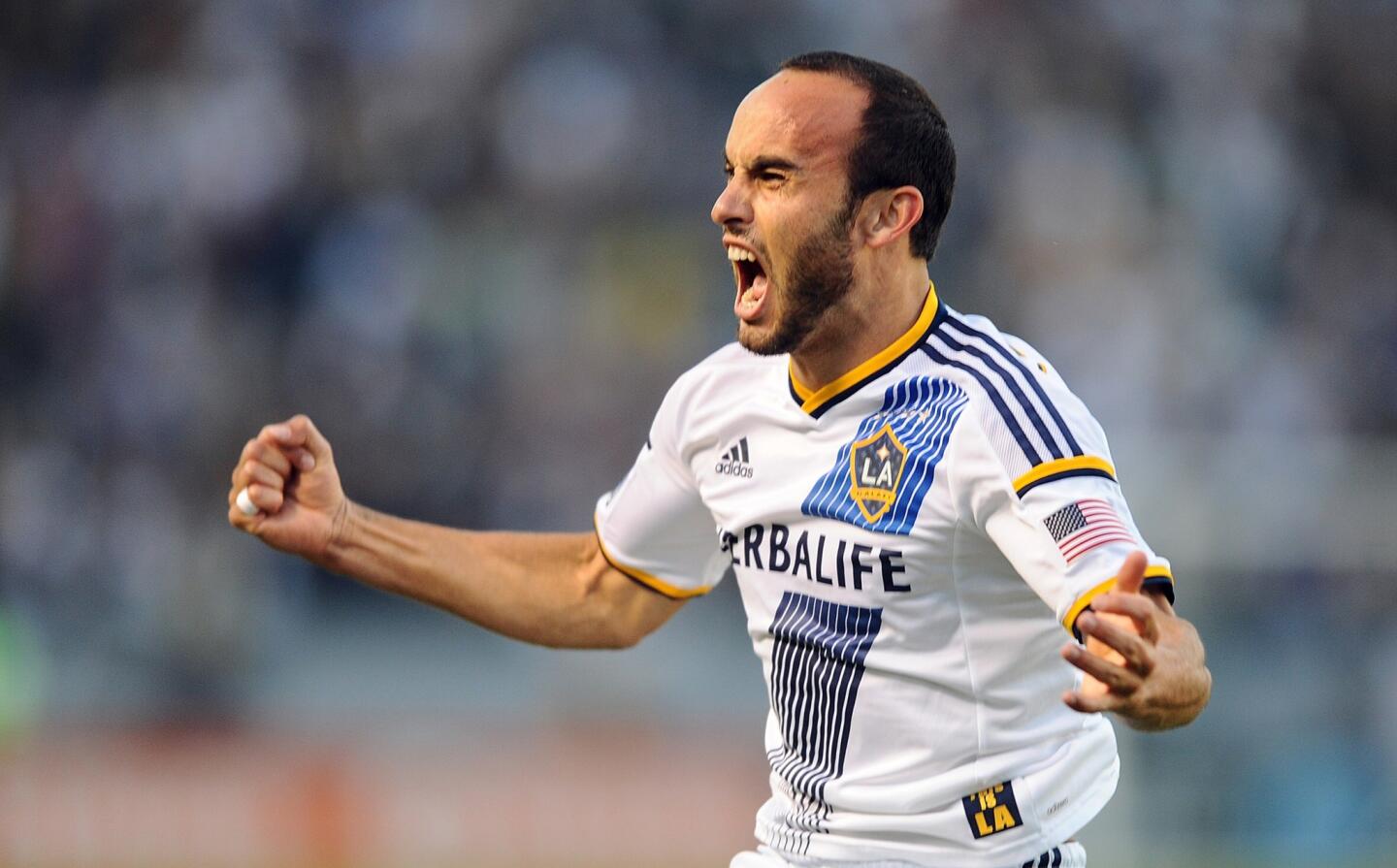 Galaxy midfielder Landon Donovan reacts after scoring the first of his three goals against Real Salt Lake in an MLS playoff game on Sunday at StubHub Center.